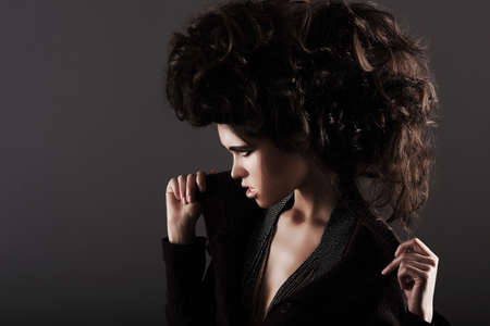 Updo. Eccentric Woman with Styled Curly Hairsの写真素材
