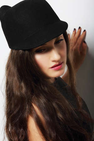 Vintage. Romantic Pensive Woman in Black Hatの写真素材