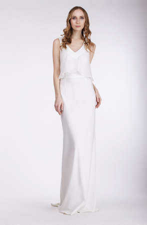 Elegance. Beautiful Bride in Sleeveless Dressの写真素材