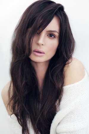 Stylish portrait of a young woman with natural make-up. Natural light.の写真素材