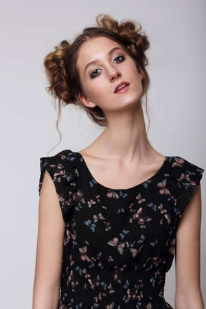 Portrait of a cute young woman. Funny, unusual.の写真素材