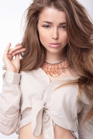 Portrait of a beautiful young woman with perfect skin.の写真素材