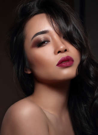 Beautiful asian woman's portrait. Professional makeup.の写真素材