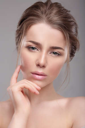Portrait of a woman with natural make-up. Plump lips. Tender.の写真素材