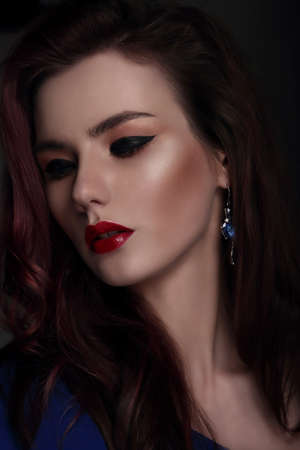 Portrait of a woman. Close-up, fashion arrow.の写真素材