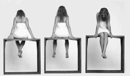 Three women sit on a cube. Art, concept, collage. Black and white.の写真素材