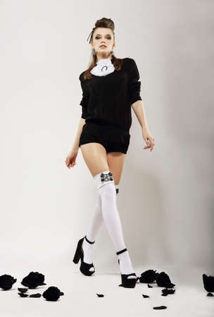 Young woman posing full length. の写真素材
