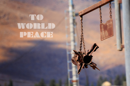 Abstract To World Peace picture with rusty rocket. Pointing to the way.の写真素材