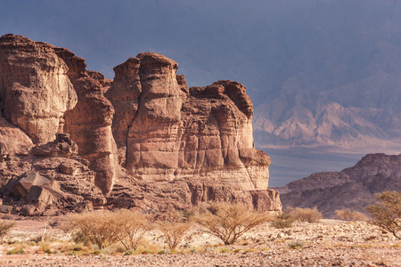 Timna Park, Israel, Arava desert near Eilat. Red rocks on the mountains background.の写真素材