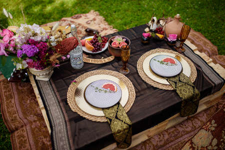 Wedding decor in boho style. Table of the bride and groomの写真素材