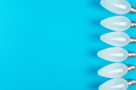LED light bulbs on a blue background. Top view. Pattern.の写真素材