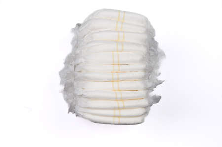 A stack of disposable diapers isolated on a white backgroundの写真素材