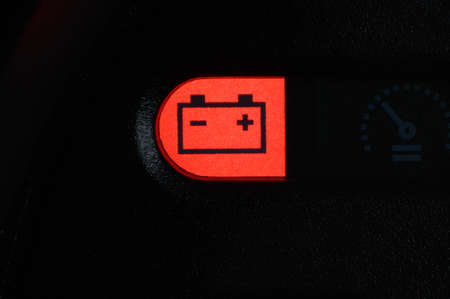 Close-up of the battery charge indicator light on the dashboard of the car.の写真素材