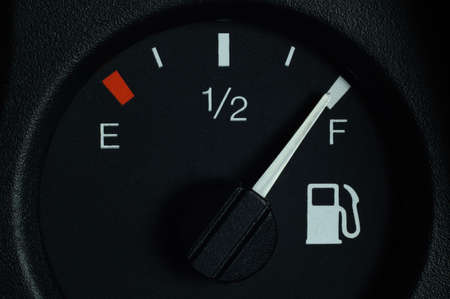 The fuel level indicator on the dashboard is at the full tank mark, close-upの写真素材