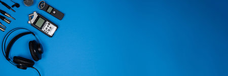 Banner, layout of accessories for recording and listening to sound: headphones, voice recorders,...