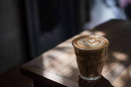 Coffee in the shade of lightの写真素材