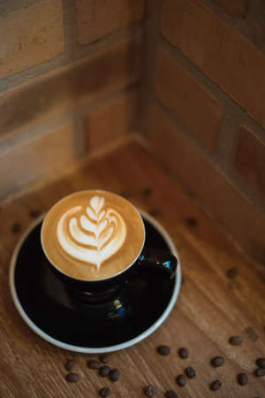 Hot  latte and coffee beansの写真素材