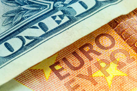 U.S. one dollar bill and ten euroの写真素材