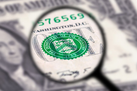 US one dollar bill under magnification glass