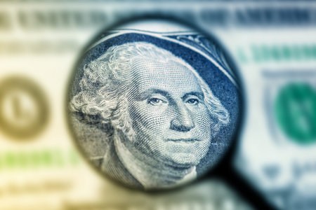 US one dollar bill under magnification glass