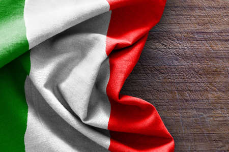 Flag of Italy on wood backgroundの写真素材