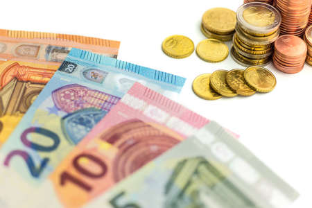Euro Money Stacks and Bills on White Backgroundの写真素材