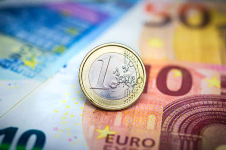 One Euro Coin on banknotesの写真素材