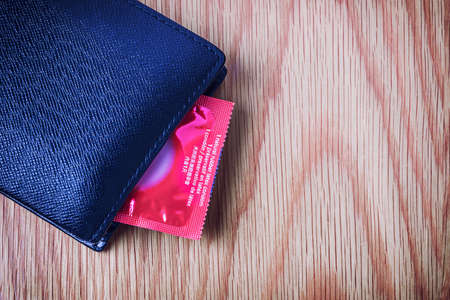 Condom put inside man wallet, Safe sex conceptの写真素材