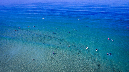 Surfers and surfboards from above in La Jolla, Californiaの写真素材