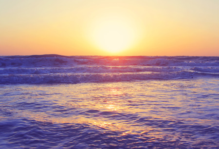 An abstract ocean seascape waves background evening sunset sunrise vintage filterの写真素材