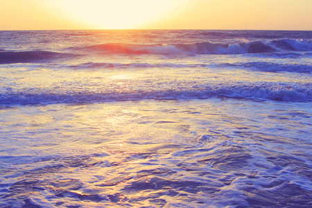 An abstract ocean seascape waves background evening sunset sunrise vintage filterの写真素材