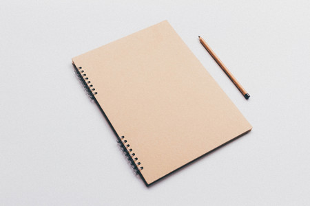 Blank notes with pencils, clean mock upの写真素材