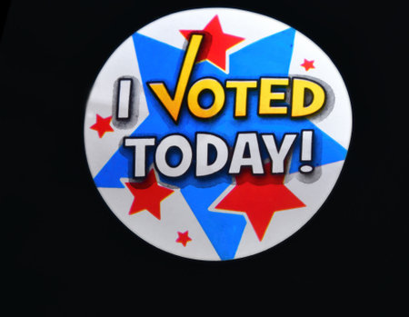 Colorful "I voted today" sticker on a black background.の写真素材