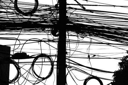 In the streets of Thailand we can often find these curious messes of electrical cables.の写真素材