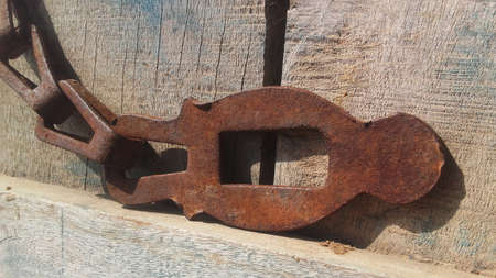 Old rusty chain to lock the door. Cultural door locks used in rural areas.の写真素材