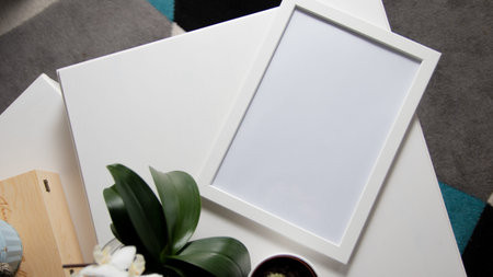 Blank photo frame on a white table. photo frame mockup