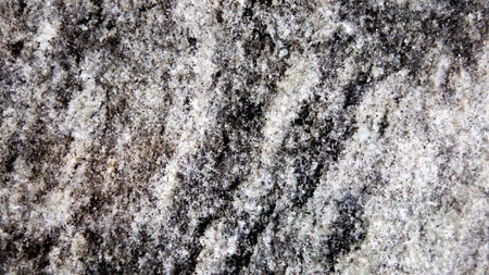 Close up of granite texture for background. Black and white tone.