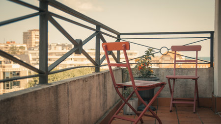Outdoor terrace with chair and table, vintage filter effect.の写真素材