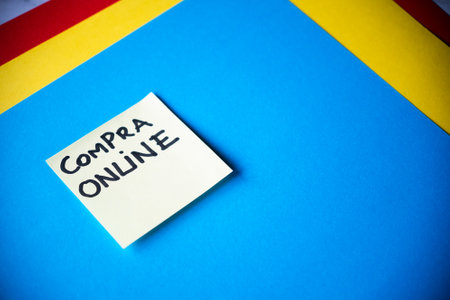 Conceptual hand writing text caption inspiration showing Company Online. Business concept for E-commerce E-commerce written on sticky note on colorful background. ONLINE SHOPPINGの写真素材