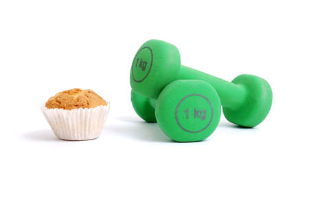 cake and fitness dumbbellsの写真素材