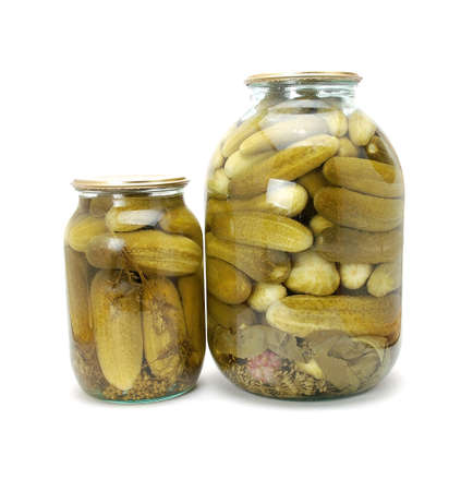 Marinaded cucumbers in glass jarsの写真素材
