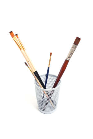 glass with brushesの写真素材