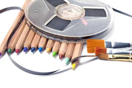 still life of pencils, brushes and filmの写真素材
