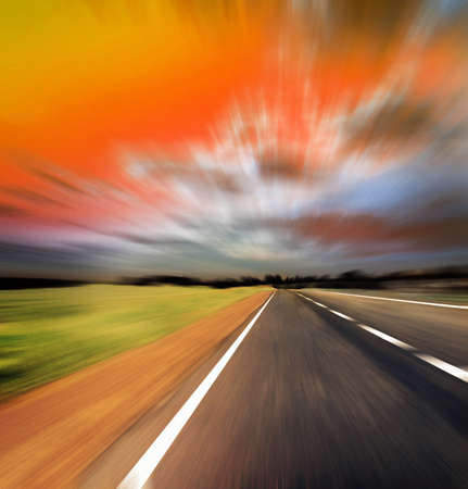 blured road and blue skyの写真素材