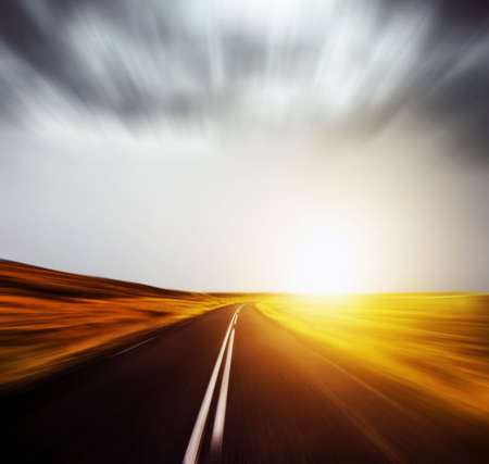blured road and blured skyの写真素材