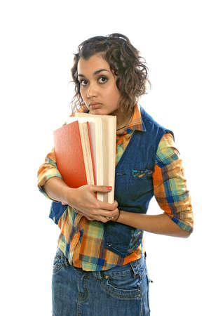 Indian student with books in hand isolated over white background.の写真素材