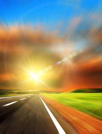 blured road and blue skyの写真素材