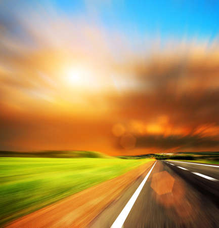 blured road and blue skyの写真素材