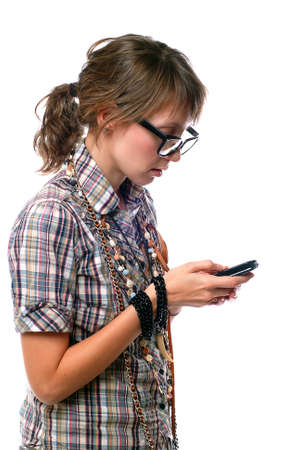 talking girl holds phoneの写真素材