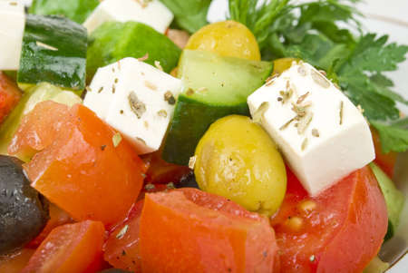 Feta salad with tomatoes and green olivesの写真素材